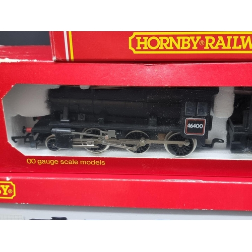 182 - Hornby: three boxed locomotives, to include Merchant Navy Class 'Canadian Pacific', R2171, and a GWR... 