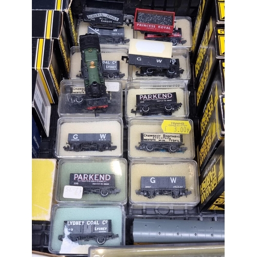 187 - Graham Farish: a group of boxed N gauge locomotives and wagons; together with further examples ... 