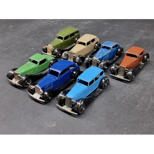 197 - Dinky: a group of seven vintage unboxed cars, to include a tan/black Daimler and a Vauxhall Saloon i... 