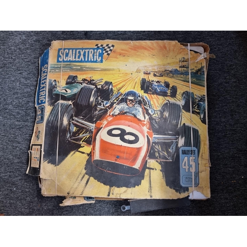 216 - Scalextric: a vintage boxed 'Mighty Metro' racing car set and a part set 'Scalextric Rally 45'; toge... 