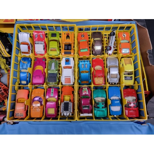 226 - Matchbox: a vintage Matchbox carry case enclosing a collection of Majorette, Matchbox and Corgi cars... 