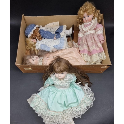 227 - Dolls: a Dianna Effner 'Emily' doll; together with a group of nine similar porcelain head dolls, lar... 