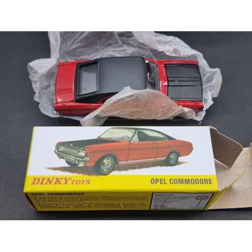 23 - Dinky Atlas Editions: a group of seven boxed vehicles, to include Opel Commodore and Bedford Co... 