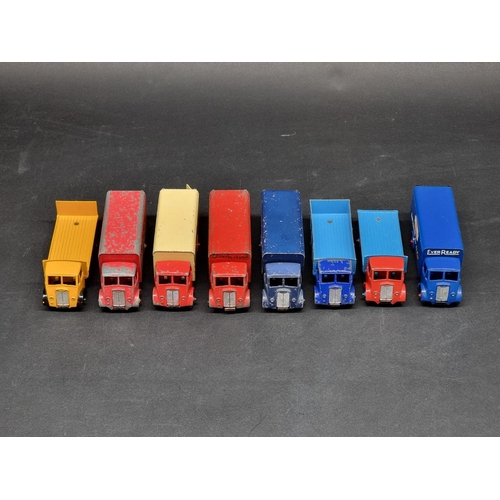 236 - Vintage Diecast: a group of eight Dinky Guy Trucks, to include 'Spratt's' and 'Slumberland' exa... 