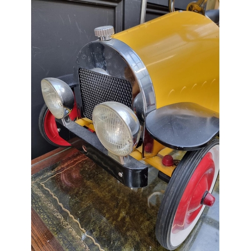 241 - Pedal Car: a modern child's pressed steel pedal car, 96cm long, 20cm height to seat.... 