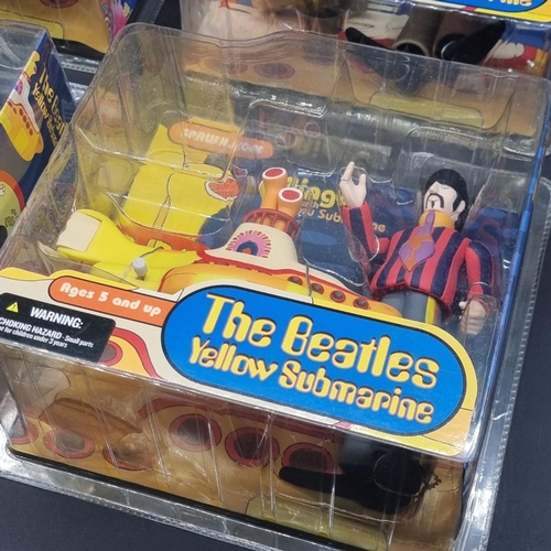 3 - The Beatles: a complete set of 4 'Yellow Submarine' action figures by McFarlane Toys, sealed in... 