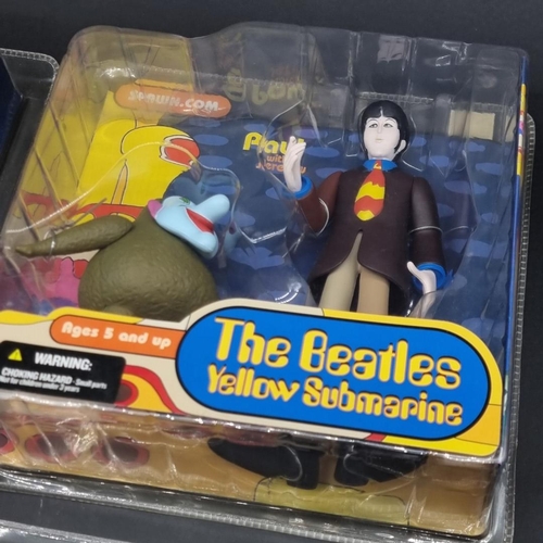 3 - The Beatles: a complete set of 4 'Yellow Submarine' action figures by McFarlane Toys, sealed in... 