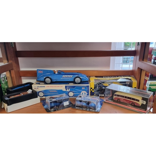 31 - Schylling: 'Sir Ian's Bluebird Land Speed Record Car', tinplate wind-up car in box; together with tw... 