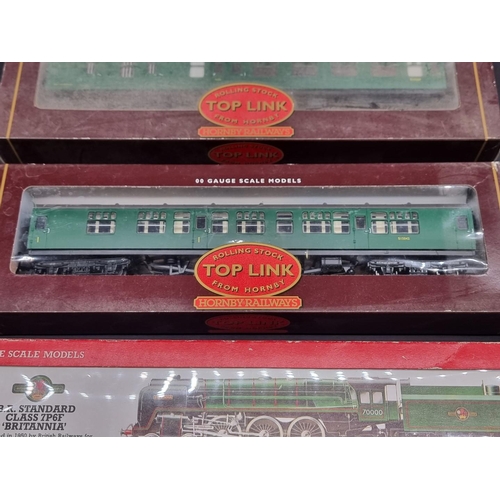 41 - Hornby: three boxed locomotives, comprising: Class 7P6F 'Britannia'; Schools Class V 'Dover', and a ... 