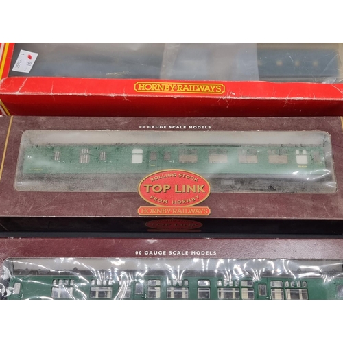 41 - Hornby: three boxed locomotives, comprising: Class 7P6F 'Britannia'; Schools Class V 'Dover', and a ... 