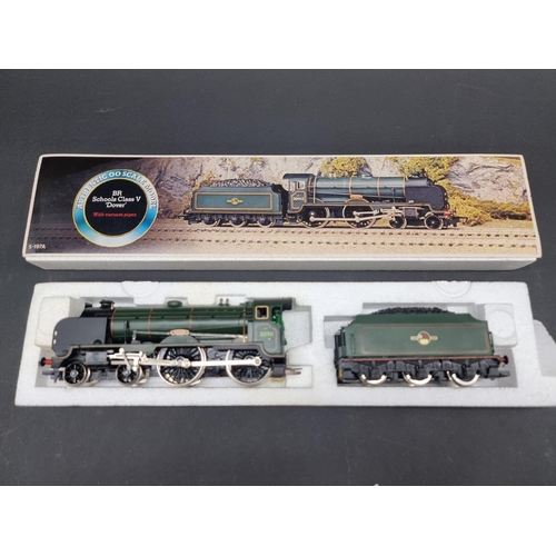 41 - Hornby: three boxed locomotives, comprising: Class 7P6F 'Britannia'; Schools Class V 'Dover', and a ... 