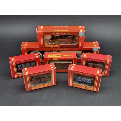 44 - Hornby: a boxed Class 5 LMS locomotive; together with another GWR tank loco; and five goods wagons, ... 