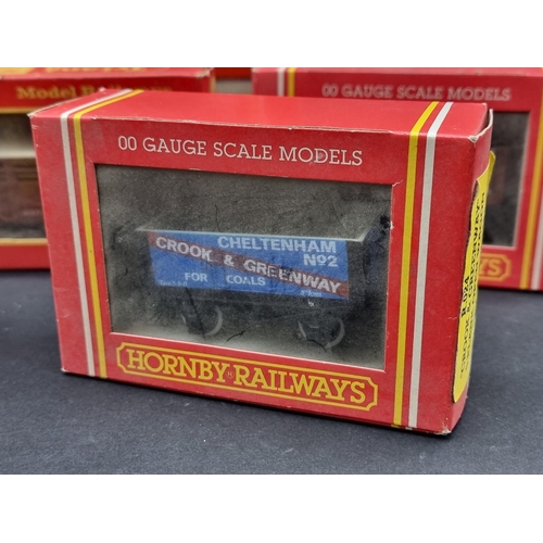 44 - Hornby: a boxed Class 5 LMS locomotive; together with another GWR tank loco; and five goods wagons, ... 