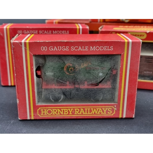 44 - Hornby: a boxed Class 5 LMS locomotive; together with another GWR tank loco; and five goods wagons, ... 