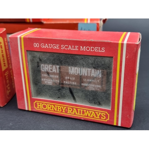 44 - Hornby: a boxed Class 5 LMS locomotive; together with another GWR tank loco; and five goods wagons, ... 