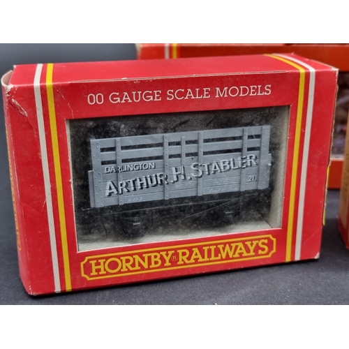 44 - Hornby: a boxed Class 5 LMS locomotive; together with another GWR tank loco; and five goods wagons, ... 