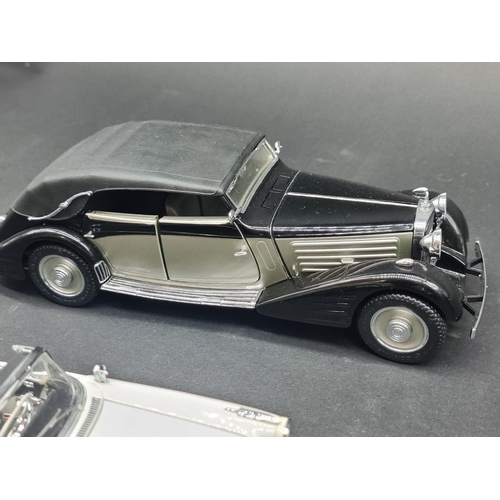 49 - Franklin Mint: a collection of five 1/24 scale models, to include a 1929 Maybach Zeppelin, and ... 