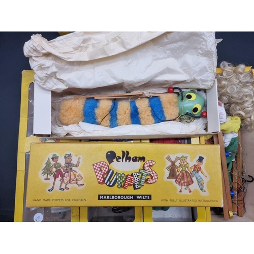 51 - Pelham Puppets: a group of nine boxed puppets, to include Skeleton and Caterpillar; together with a ... 