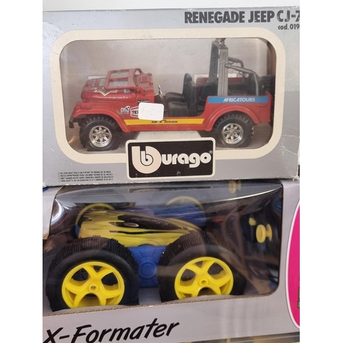 56 - Burago: a Porsche 911 model car and three other similar examples; together with a battery operated '... 