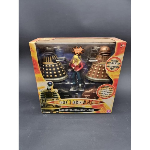 6 - Dr Who: a Sonic Screwdriver; together with a similar radio controlled Dalek Battle Pack, (both ... 