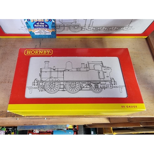 60 - Hornby: three boxed locomotives, to include Schools Class V5 locomotive 'Eastbourne', R2144, an... 