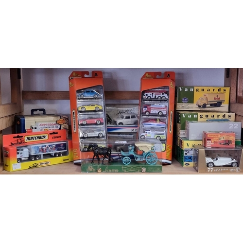 61 - Diecast: a group of boxed diecast vehicles, to include examples by Vanguards, Matchbox, Corgi, ... 