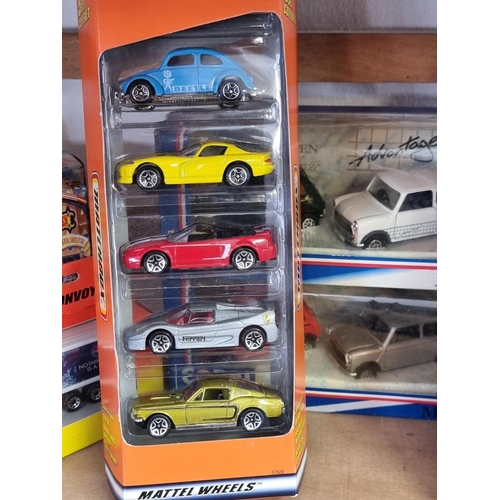 61 - Diecast: a group of boxed diecast vehicles, to include examples by Vanguards, Matchbox, Corgi, ... 