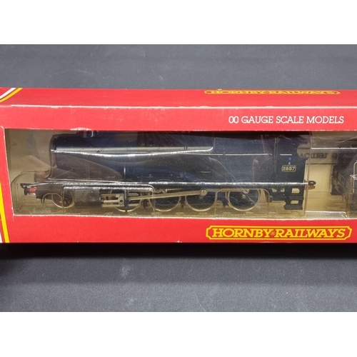 65 - Hornby: three boxed locomotives, to include a Merchant Navy Class 'Clan Line', R2169, and a GWR... 