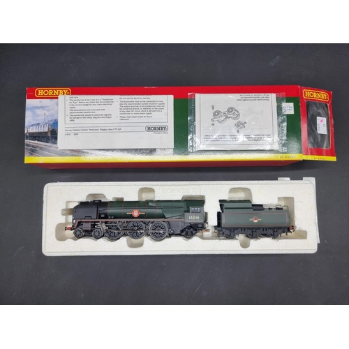 65 - Hornby: three boxed locomotives, to include a Merchant Navy Class 'Clan Line', R2169, and a GWR... 