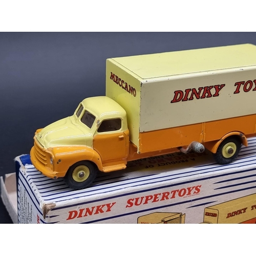 66 - Dinky: a good 'Bedford Pallet Jekta Van', No.930, complete with pallets; together with a boxed Dinky... 