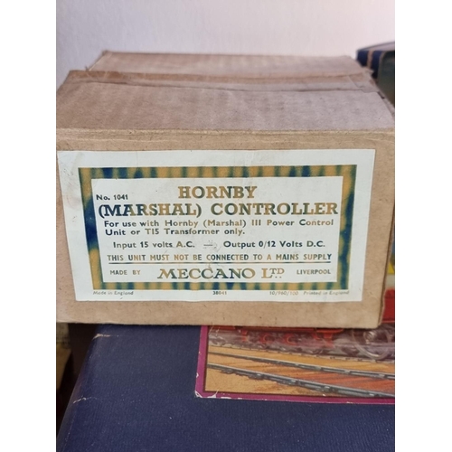 68 - Hornby: a vintage boxed clockwork MO Passenger Set, and boxed Meccano controller; together with two ... 