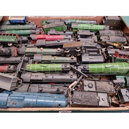 71 - Railway: a large quantity of unboxed and playworn locomotives and wagons, some repaints with lo... 