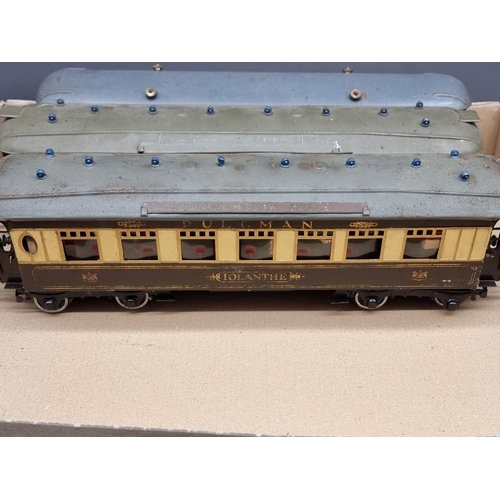 75 - Hornby O Gauge: a set of four Pullman coaches and two others; together with a Southern 2091 loc... 