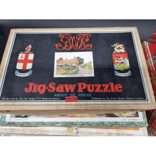 77 - Jigsaw Puzzles: fifteen vintage wooden puzzles by Victory and similar, to include a 'Ships' exa... 