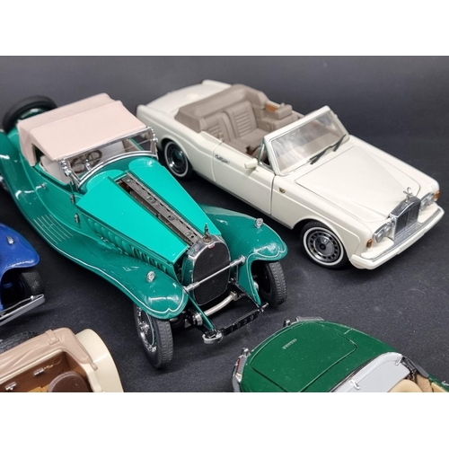 80 - Franklin Mint: seven 1/24 scale models, to include a 1992 Rolls-Royce Corniche 41B. (7)... 