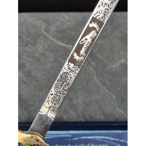 560 - A Battle of Britain 50th Anniversary Commemorative dagger, with 24.5cm blade, in fitted case.... 