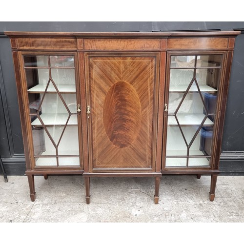 1033 - A circa 1920 mahogany and chequer strung breakfront bookcase, 137.5cm wide.