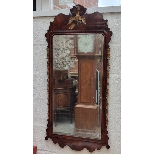 1092 - A large 18th century walnut and parcel gilt fret frame wall mirror, 117 x 56cm.