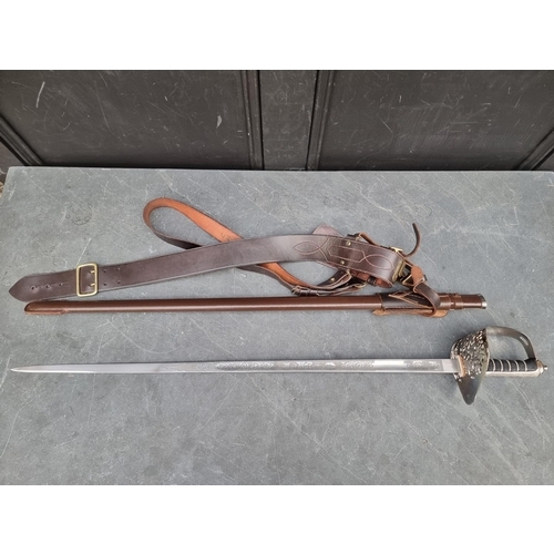 542 - An Elizabeth II 1897 pattern Nco's or officer's sword and scabbard, with belt.