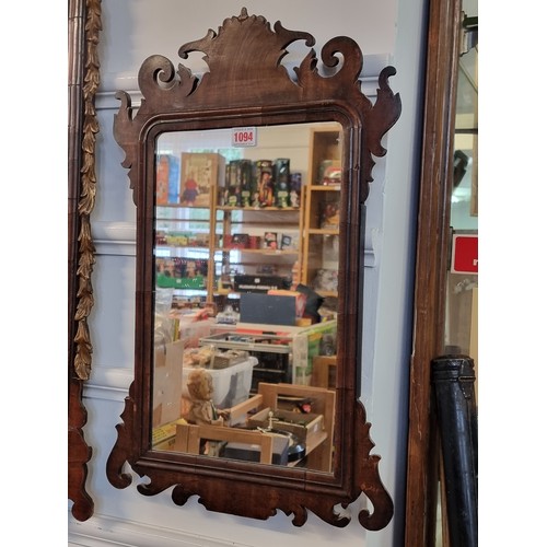 1094 - An 18th century mahogany fret frame wall mirror, 59 x 37.5cm.