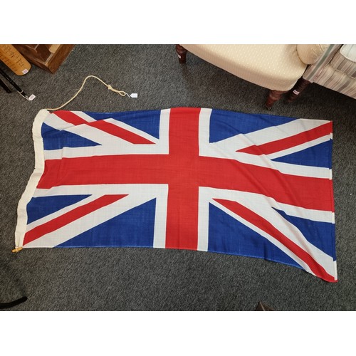 1676A - Flag: a 1977 (Silver Jubilee) Union flag, approx 178 x 91cm.