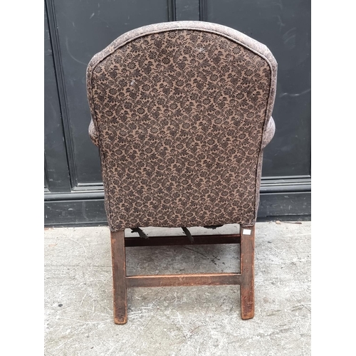 1070 - A George III mahogany elbow chair.