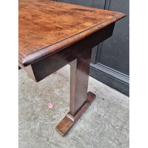 1000 - A Victorian mahogany centre table, with single drawer and trestle ends, 108cm wide.