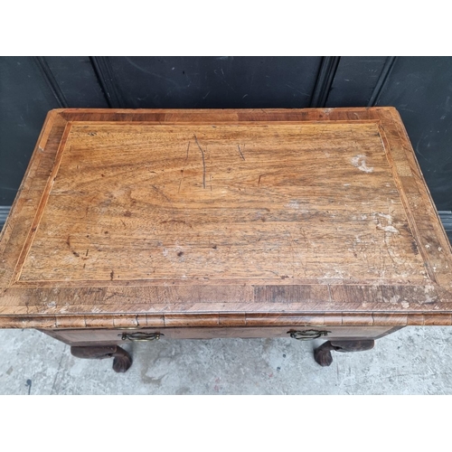 1002 - A George I/II walnut, line inlaid and crossbanded lowboy, 76cm wide.