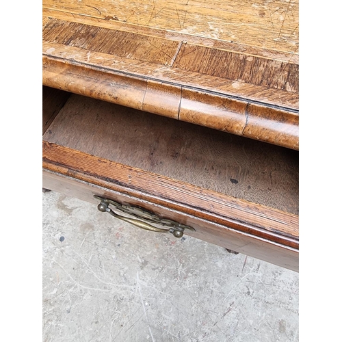 1002 - A George I/II walnut, line inlaid and crossbanded lowboy, 76cm wide.