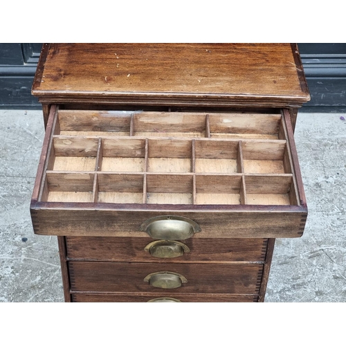 1007 - A 1930s stained beech collector's type chest, 72.5cm high x 48cm wide.