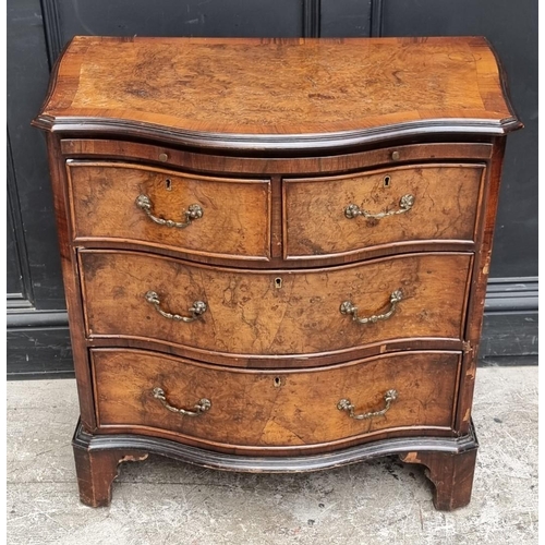 1008 - A 1930s burr walnut and crossbanded serpentine fronted chest of drawers, with brushing slide, 71cm w... 