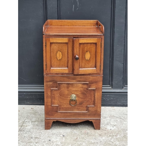 1012 - A 19th century mahogany and inlaid commode, 45cm wide.