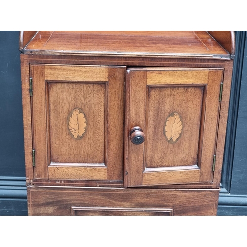 1012 - A 19th century mahogany and inlaid commode, 45cm wide.