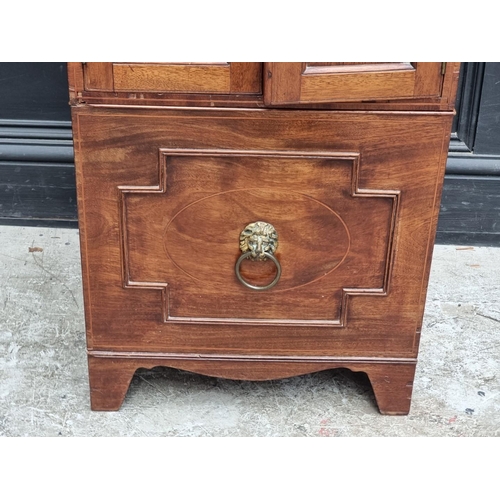 1012 - A 19th century mahogany and inlaid commode, 45cm wide.